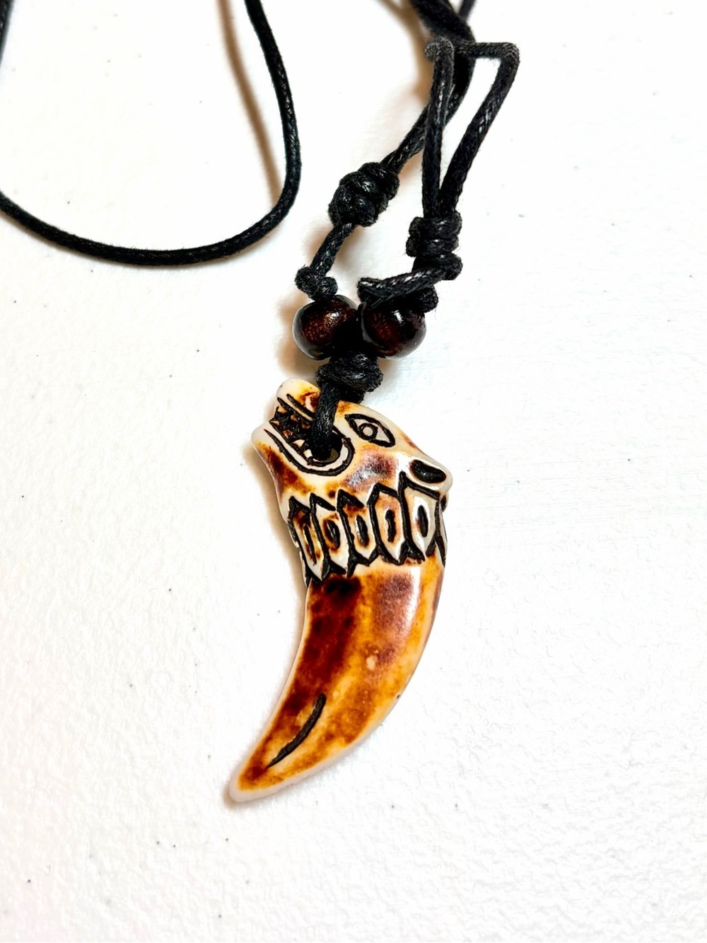 Reptile-Themed Brown Pendant.